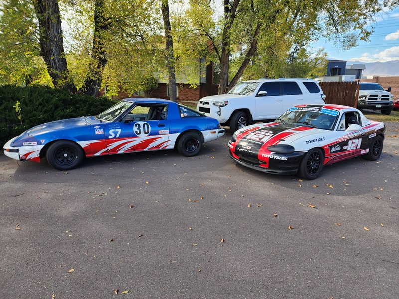 Two LFR Spec Miatas lined up in the paddock before a session